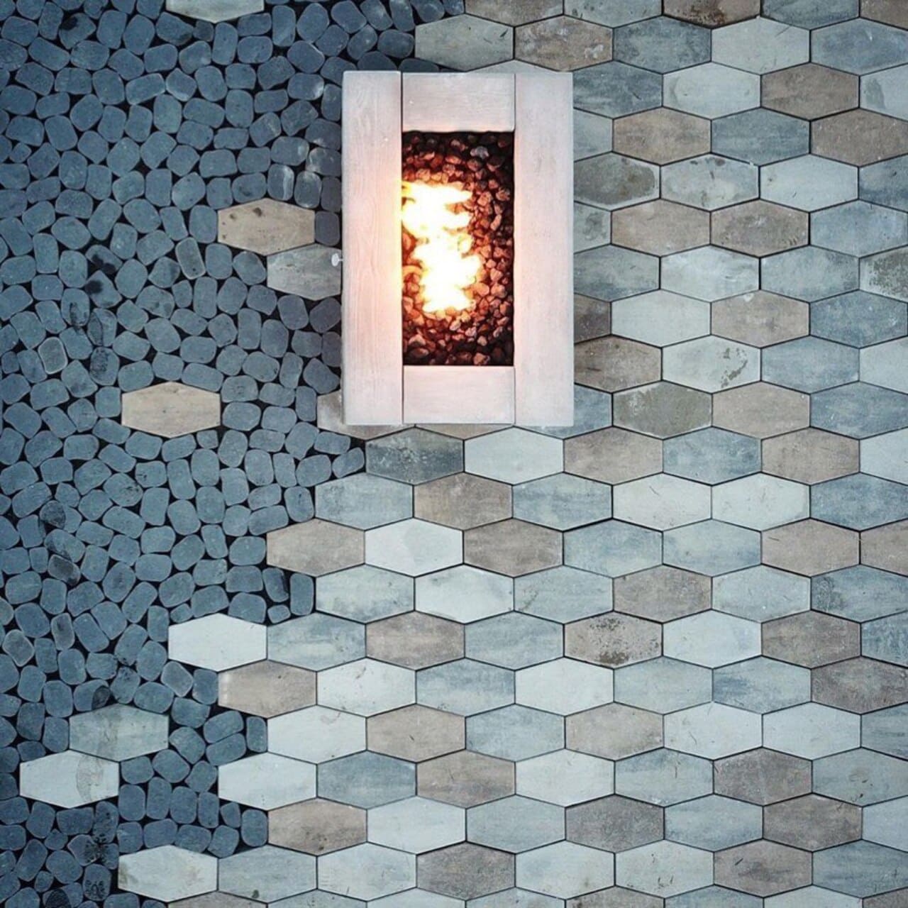 Custom paver patio with a built-in gas fire pit, installed by Stone and Outdoor Living Center