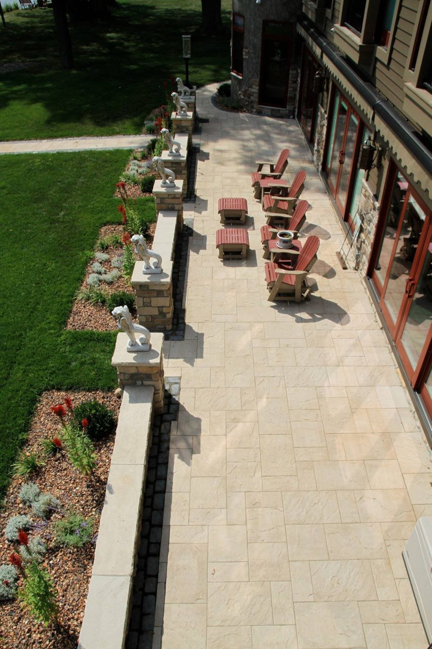 Stone pavers stacked in the yard, ready to choose from